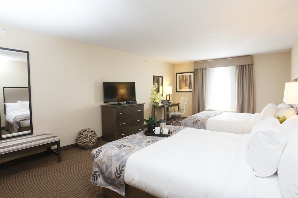 Pomeroy Inn & Suites At Olds College Chambre photo