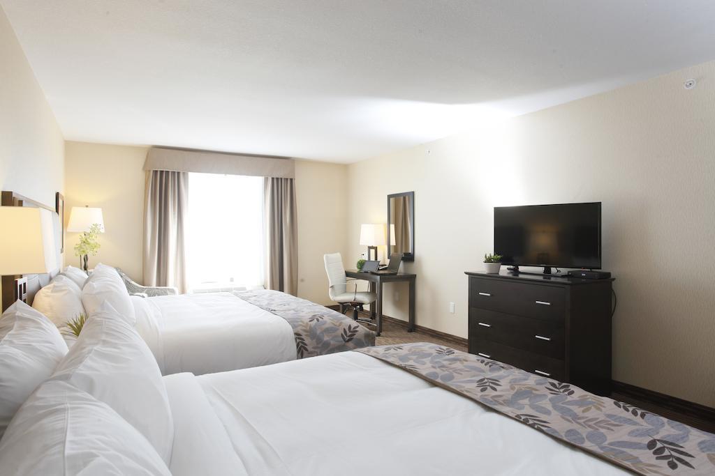 Pomeroy Inn & Suites At Olds College Chambre photo
